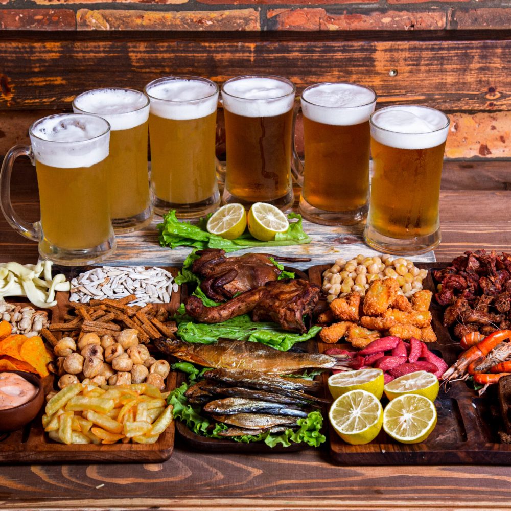 variety-snacks-nuts-with-beer-cups